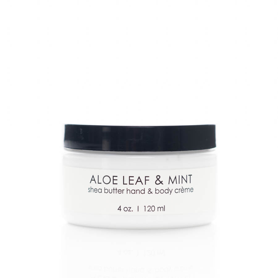 A white jar with a black lid labeled "Aloe Leaf & Mint shea butter hand & body crème." The text also shows the container holds 4 oz. (120 ml).