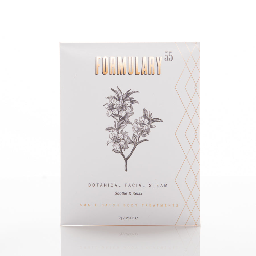 A white packaging of "Formulary 55" Botanical Facial Steam. The front features a monochrome illustration of a flowering plant and the text "Soothe & Relax." Additional text at the bottom reads "Small Batch Body Treatments." The package contains 7oz / 25g of product.